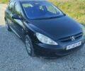 Черный Пежо 307, объемом двигателя 2 л и пробегом 330 тыс. км за 3600 $, фото 1 на Automoto.ua