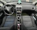 Черный Пежо 307, объемом двигателя 2 л и пробегом 300 тыс. км за 3000 $, фото 5 на Automoto.ua