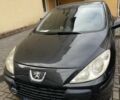Черный Пежо 307, объемом двигателя 2 л и пробегом 240 тыс. км за 3669 $, фото 1 на Automoto.ua
