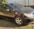 Черный Пежо 307, объемом двигателя 2 л и пробегом 205 тыс. км за 3900 $, фото 1 на Automoto.ua
