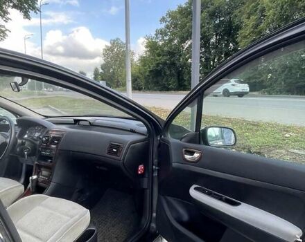 Черный Пежо 307, объемом двигателя 2 л и пробегом 258 тыс. км за 5200 $, фото 2 на Automoto.ua