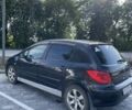 Черный Пежо 307, объемом двигателя 2 л и пробегом 258 тыс. км за 5200 $, фото 1 на Automoto.ua