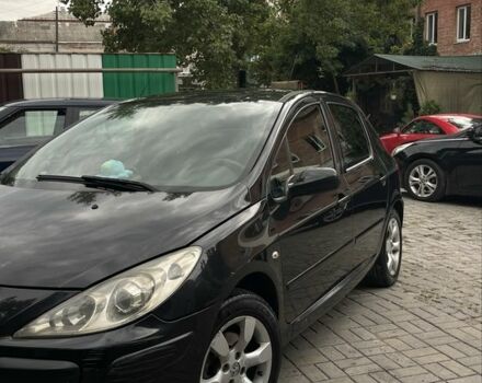 Черный Пежо 307, объемом двигателя 2 л и пробегом 300 тыс. км за 3000 $, фото 1 на Automoto.ua