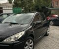 Черный Пежо 307, объемом двигателя 2 л и пробегом 300 тыс. км за 3000 $, фото 1 на Automoto.ua