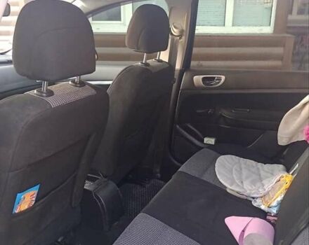 Черный Пежо 307, объемом двигателя 1.6 л и пробегом 187 тыс. км за 3600 $, фото 3 на Automoto.ua