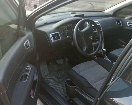 Черный Пежо 307, объемом двигателя 1.6 л и пробегом 187 тыс. км за 3600 $, фото 6 на Automoto.ua