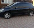 Черный Пежо 307, объемом двигателя 1.6 л и пробегом 187 тыс. км за 3600 $, фото 1 на Automoto.ua