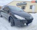 Черный Пежо 307, объемом двигателя 2 л и пробегом 130 тыс. км за 4900 $, фото 1 на Automoto.ua