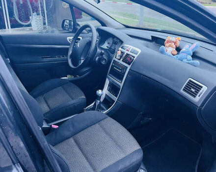 Черный Пежо 307, объемом двигателя 2 л и пробегом 219 тыс. км за 3600 $, фото 16 на Automoto.ua