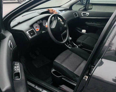 Черный Пежо 307, объемом двигателя 2 л и пробегом 219 тыс. км за 3600 $, фото 9 на Automoto.ua