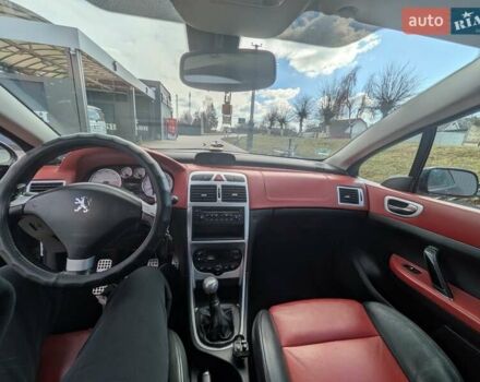 Черный Пежо 307, объемом двигателя 2 л и пробегом 218 тыс. км за 5750 $, фото 7 на Automoto.ua