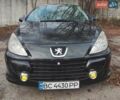 Черный Пежо 307, объемом двигателя 2 л и пробегом 185 тыс. км за 5300 $, фото 4 на Automoto.ua