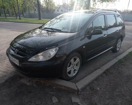 Чорний Пежо 307, об'ємом двигуна 2 л та пробігом 326 тис. км за 3999 $, фото 4 на Automoto.ua