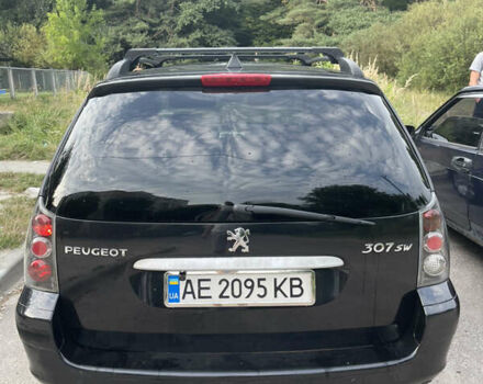 Чорний Пежо 307, об'ємом двигуна 1.59 л та пробігом 337 тис. км за 4400 $, фото 7 на Automoto.ua