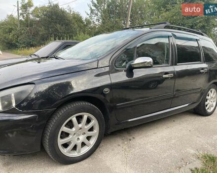 Чорний Пежо 307, об'ємом двигуна 1.59 л та пробігом 337 тис. км за 4400 $, фото 8 на Automoto.ua