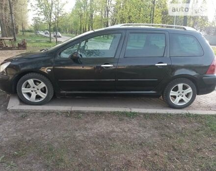 Чорний Пежо 307, об'ємом двигуна 2 л та пробігом 326 тис. км за 3999 $, фото 3 на Automoto.ua