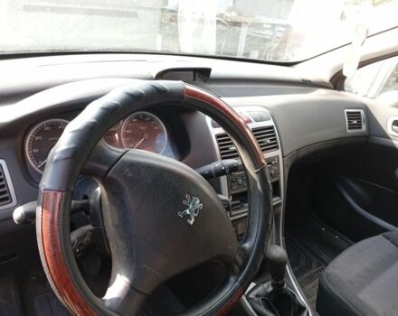 Черный Пежо 307, объемом двигателя 2 л и пробегом 235 тыс. км за 4200 $, фото 9 на Automoto.ua