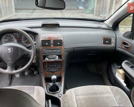 Чорний Пежо 307, об'ємом двигуна 1.4 л та пробігом 385 тис. км за 3350 $, фото 6 на Automoto.ua