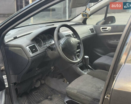 Черный Пежо 307, объемом двигателя 2 л и пробегом 200 тыс. км за 2700 $, фото 4 на Automoto.ua