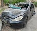 Черный Пежо 307, объемом двигателя 2 л и пробегом 400 тыс. км за 576 $, фото 1 на Automoto.ua