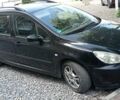 Черный Пежо 307, объемом двигателя 1.59 л и пробегом 191 тыс. км за 3350 $, фото 1 на Automoto.ua