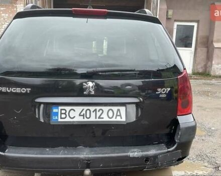 Чорний Пежо 307, об'ємом двигуна 1.4 л та пробігом 385 тис. км за 3350 $, фото 4 на Automoto.ua