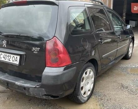 Чорний Пежо 307, об'ємом двигуна 1.4 л та пробігом 385 тис. км за 3350 $, фото 2 на Automoto.ua