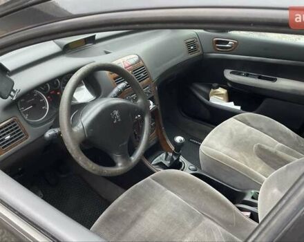 Чорний Пежо 307, об'ємом двигуна 1.4 л та пробігом 385 тис. км за 3350 $, фото 3 на Automoto.ua
