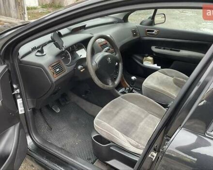 Чорний Пежо 307, об'ємом двигуна 1.4 л та пробігом 385 тис. км за 3350 $, фото 5 на Automoto.ua