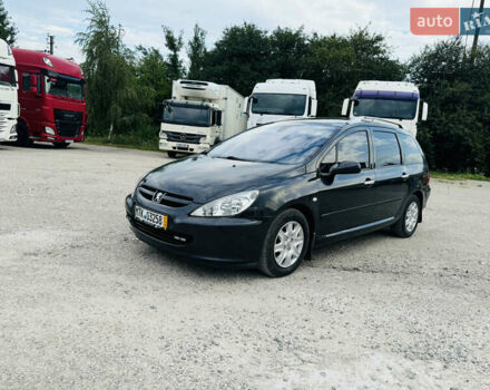 Черный Пежо 307, объемом двигателя 1.6 л и пробегом 204 тыс. км за 4500 $, фото 1 на Automoto.ua