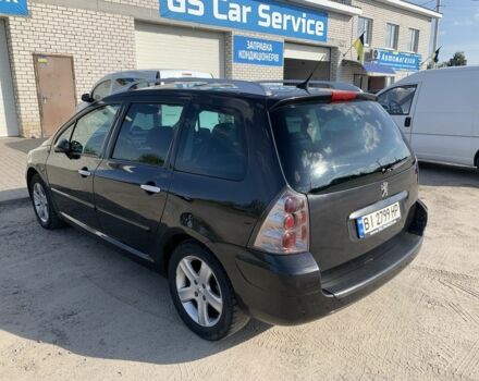Черный Пежо 307, объемом двигателя 2 л и пробегом 283 тыс. км за 4700 $, фото 2 на Automoto.ua