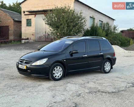 Чорний Пежо 307, об'ємом двигуна 1.6 л та пробігом 200 тис. км за 4200 $, фото 6 на Automoto.ua