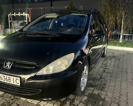 Черный Пежо 307, объемом двигателя 2 л и пробегом 200 тыс. км за 3100 $, фото 1 на Automoto.ua