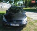 Черный Пежо 307, объемом двигателя 1.4 л и пробегом 228 тыс. км за 3900 $, фото 1 на Automoto.ua