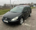 Черный Пежо 307, объемом двигателя 1.56 л и пробегом 285 тыс. км за 4200 $, фото 1 на Automoto.ua