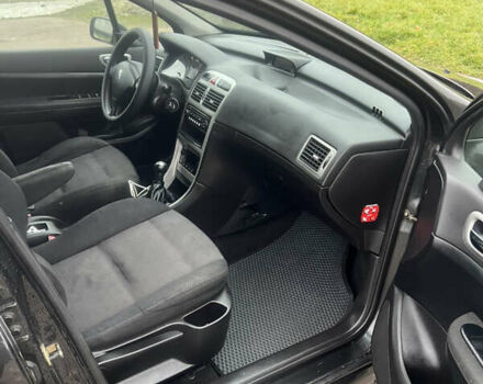 Черный Пежо 307, объемом двигателя 1.56 л и пробегом 285 тыс. км за 4200 $, фото 8 на Automoto.ua