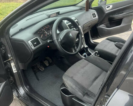 Черный Пежо 307, объемом двигателя 1.56 л и пробегом 285 тыс. км за 4200 $, фото 11 на Automoto.ua