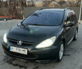 Черный Пежо 307, объемом двигателя 1.6 л и пробегом 178 тыс. км за 5000 $, фото 1 на Automoto.ua