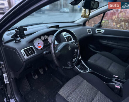 Черный Пежо 307, объемом двигателя 1.6 л и пробегом 263 тыс. км за 4499 $, фото 43 на Automoto.ua
