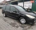Черный Пежо 307, объемом двигателя 1.6 л и пробегом 347 тыс. км за 4440 $, фото 1 на Automoto.ua