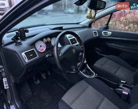 Черный Пежо 307, объемом двигателя 1.6 л и пробегом 263 тыс. км за 4499 $, фото 42 на Automoto.ua