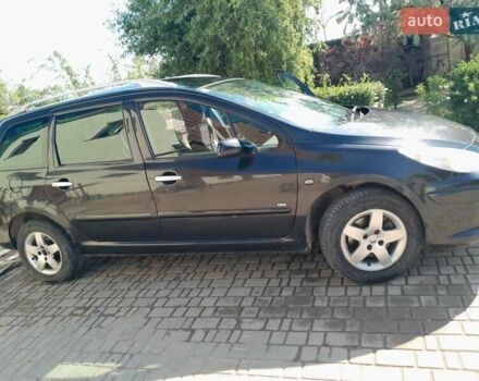 Чорний Пежо 307, об'ємом двигуна 1.59 л та пробігом 290 тис. км за 4200 $, фото 3 на Automoto.ua