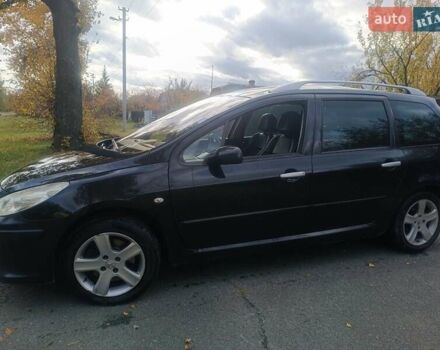 Черный Пежо 307, объемом двигателя 2 л и пробегом 300 тыс. км за 5500 $, фото 5 на Automoto.ua