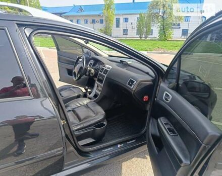 Чорний Пежо 307, об'ємом двигуна 2 л та пробігом 247 тис. км за 5300 $, фото 7 на Automoto.ua