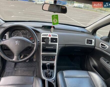 Чорний Пежо 307, об'ємом двигуна 1.59 л та пробігом 303 тис. км за 3900 $, фото 9 на Automoto.ua