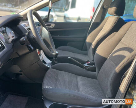 Черный Пежо 307, объемом двигателя 1.6 л и пробегом 219 тыс. км за 5700 $, фото 7 на Automoto.ua