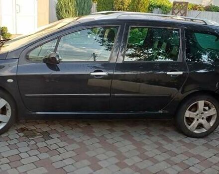 Чорний Пежо 307, об'ємом двигуна 2 л та пробігом 290 тис. км за 3700 $, фото 1 на Automoto.ua