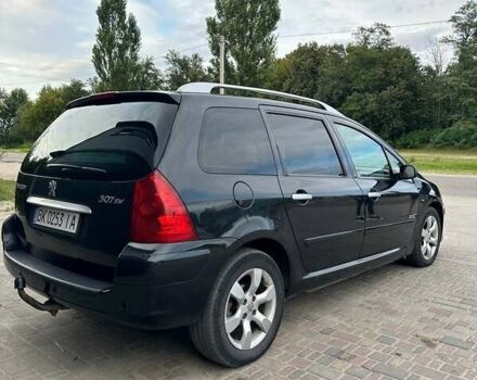 Черный Пежо 307, объемом двигателя 1.56 л и пробегом 242 тыс. км за 4300 $, фото 9 на Automoto.ua