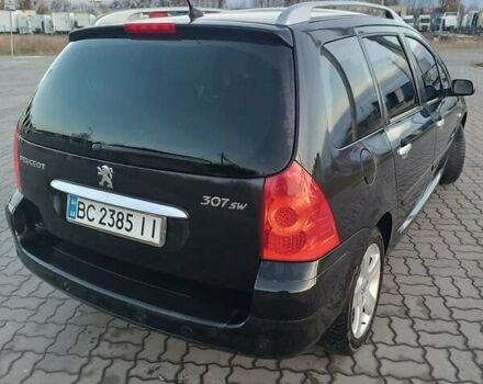 Черный Пежо 307, объемом двигателя 1.56 л и пробегом 328 тыс. км за 4700 $, фото 8 на Automoto.ua