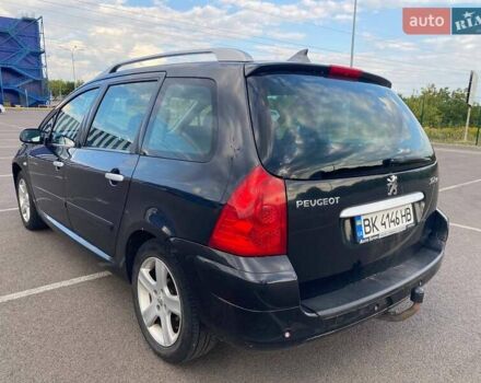 Чорний Пежо 307, об'ємом двигуна 1.59 л та пробігом 303 тис. км за 3900 $, фото 2 на Automoto.ua
